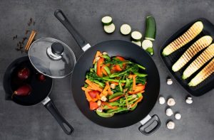How is cooking in a wok different?